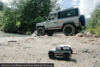  ??  ?? Herschel x Hot Wheels Land Rover Defender 90 toy car.