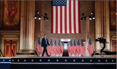  ?? (AP/Andrew Harnik) ?? Eric Trump, the son of President Donald Trump, arrives Tuesday at the Andrew W. Mellon Auditorium in Washington to tape his speech for the second day of the Republican National Convention. “In the view of the radical Democrats, America is the source of the world’s problems,” he asserted. “The Democrats want an America where your thoughts and opinions are censored when they do not align with their own.”