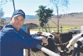  ?? Picture: CASSANDRA GLOVER ?? FAIR PRICE: Greenmount dairy farmer Scott Priebbenow is calling on supermarke­ts to up the price of milk and save the Queensland dairy industry.