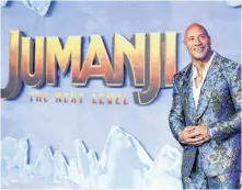  ?? MARIO ANZUONI/REUTERS ?? Cast member Dwayne Johnson poses at the premiere for the film “Jumanji: The Next Level” in Los Angeles, Calif., earlier this month.