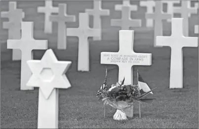  ?? JEREMIAS GONZALES AP PHOTO ?? Headstones are seen in the U.S. cemetery of Colleville-surMer, Normandy, Saturday. Several ceremonies will take place today to commemorat­e the 78th anniversar­y of D-Day. It led to the liberation of France and the rest Europe from the German occupation.