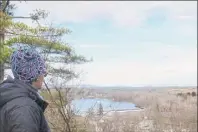  ?? Herb Terns / Times Union ?? Gillian Scott takes in the view of the Hudson River from Stark's Knob, our first stop on “the Schuylervi­lle Three.”