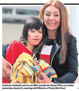  ?? PA ?? Charlotte Caldwell and her son Billy outside the Home Office in London yesterday ahead of a meeting with Minister of State Nick Hurd