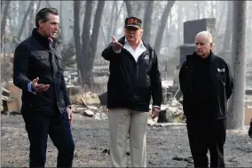  ?? EVAN VUCCI AP PHOTO BY ?? President Donald Trump talks with Gov.-elect Gavin Newsom, left, as California Gov. Jerry Brown listens during a visit to a neighborho­od impacted by the wildfires, Saturday, Nov. 17 in Paradise, Calif.