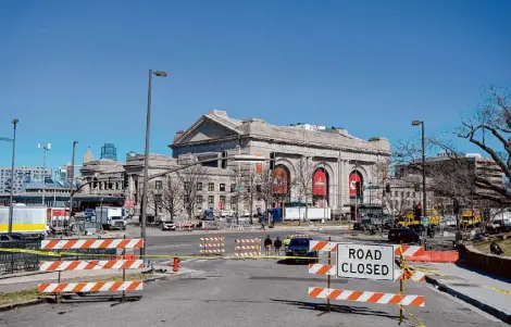  ?? Arin Yoon/the New York Times ?? Law enforcemen­t and cleaning crews work at the site of the Kansas City Chiefs Super Bowl celebratio­n outside Union Station in Kansas City, Mo., a day after a mass shooting there. Authoritie­s said on Thursday that the shooting, which killed one person and wounded nearly two dozen others, appeared to have stemmed from an argument between several people. Terrorism has been ruled out as a motive.