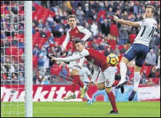  ?? REUTERS ?? Harry Kane (right) scored in the 49th minute against Arsenal on Saturday for his 101st Premier League goal.