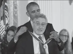  ?? OLIVIER DOULIERY/ABACA PRESS FILE PHOTOGRAPH ?? U.S. President Barack Obama presents Robert De Niro with the Presidenti­al Medal of Freedom, the nation’s highest civilian honor, during a ceremony on Nov. 22, 2016 honoring 21 recipients in the East Room of the White House in Washington, D.C.