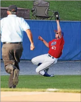 ?? AUSTIN HERTZOG - DIGITAL FIRST MEDIA ?? Boyertown left fielder Pat Maloney makes a diving catch in foul territory against Norchester last Monday.