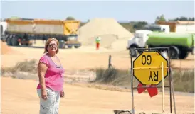  ?? Picture: ESA ALEXANDER ?? NO SAYING SORRY: Former tourism officer Lizelle Strydom at the mine that borders West Coast National Park near Hopefield