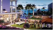  ?? KOLTER GROUP ?? An artist’s rendering shows the plaza outside the third Water Club luxury condo tower being built along the North Palm Beach waterfront.