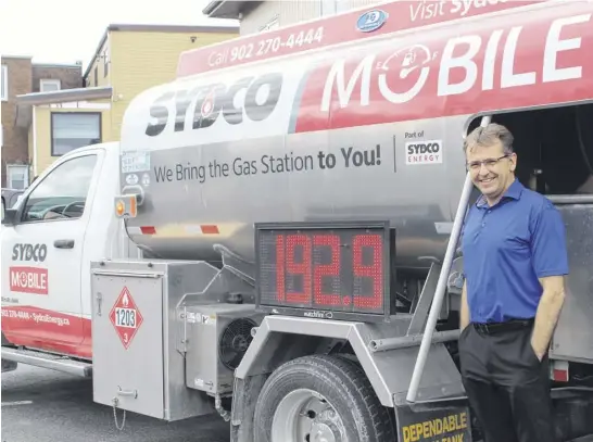  ?? ARDELLE REYNOLDS ■ CAPE BRETON POST ?? Sydco Energy manager Mike Pace hopes his investment in two delivery trucks for his company’s new gas delivery service will pay off with new loyal customers. Sydco Mobile has online and phone ordering and will fill up vehicles for residentia­l and commercial clients.