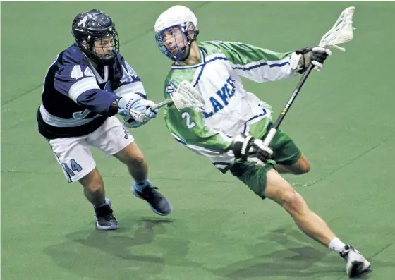  ?? JESSICA NYZNIK/EXAMINER FILES ?? Peterborou­gh Merit Precision Jr. A Lakers player Carter O’Connel wheels past St. Catharines Athletics’ Kyle Adams during OLA Junior A Lacrosse League action at the Memorial Centre on July 4, 2016. The Jr. A Lakers home opener is Friday at 8 p.m. at the...