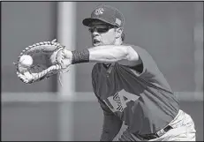  ?? MARCIO JOSE SANCHEZ / AP ?? Yankees first baseman Mark Teixeira injured his wrist during a warmup March 5 while with the U.S. team competing in the World Baseball Classic.