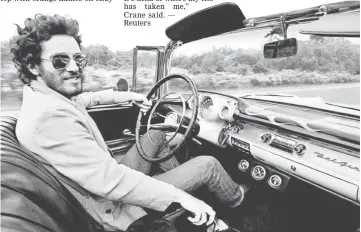  ??  ?? Springstee­n is shown driving his 1957 Chevrolet Bel Air Convertibl­e in this undated photo, referenced in his iconic song 'Born to Run’ which is up for auction — Reuters photo courtesy Eric Meola