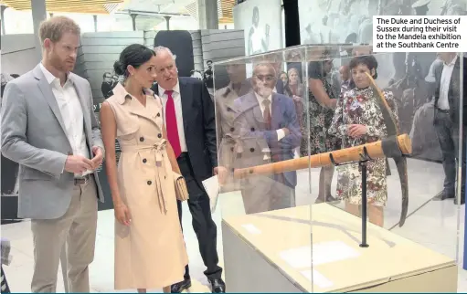  ??  ?? The Duke and Duchess of Sussex during their visit to the Mandela exhibition at the Southbank Centre