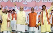  ?? — PTI ?? BJP President Amit Shah waves to his supporters at BJP Shakthi Kendra, in Hyderabad, Wednesday.