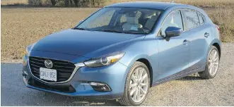  ?? JIL McINTOSH/DRIVING ?? The 2017 Mazda3 Sport GT features a new attractive hatchback configurat­ion.