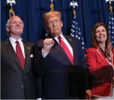  ?? AFP photo ?? Trump pumps his fist during an election night watch party at the State Fairground­s on February 24 in Columbia, South Carolina. Trump has completed a sweep of the first four major nominating contests, converting a year of blockbuste­r polls into a likely insurmount­able lead going into the “Super Tuesday” 15-state voting bonanza in 10 days.—