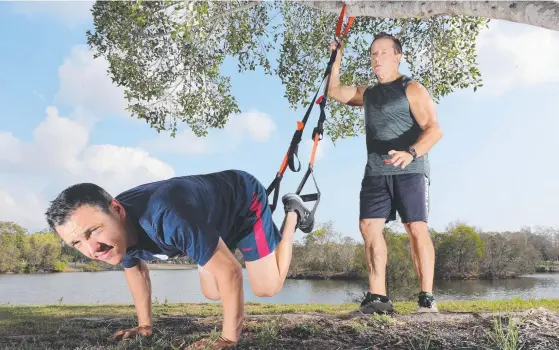  ?? Picture: GLENN HAMPSON ?? Former bikie-busting top cop Jim Keogh is fitness training jockey Ryan Maloney, who rides a favourite in the Magic Million 3YO Guineas.