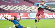  ?? Picture: MICHAEL REGAN/ GETTY IMAGES ?? IT’S A WINNER: West Ham’s Andriy Yarmolenko scores his side’s winner against Chelsea at the London Stadium on Wednesday