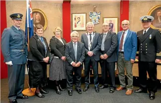  ??  ?? Airforce and naval uniforms helped set the scene when civic honours were presented at Marlboroug­h District Council on Friday. From left, Flying Officer Jeff Cameron, Melva Robb, Glenda Robb, Jim Thomas, Mayor John Leggett, Henny Vervaart, Ross Beech...