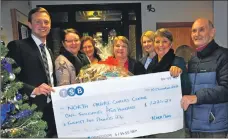  ??  ?? The TSB hands over its cheque to North Argyll Carers Centre.