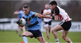  ??  ?? Darragh McConnon (right) in action for IT Sligo in the Sigerson Cup in 2017 with Dublin GAA and UCD’s Paul Mannion.