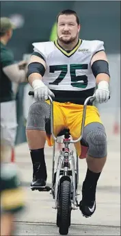  ?? Morry Gash Associated Press ?? BRYAN BULAGA, a pillar with the Packers, will get a three-year, $30-million contract with the Chargers.