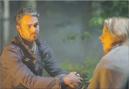  ?? — THE ASSOCIATED PRESS FILES ?? Taylor Kinney, left, and Natalie Dormer star in The Forest, a thriller about a woman who goes looking for her missing twin in Japan. The film delivers a few clever unexpected shocks.