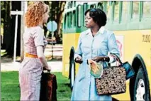 ?? DALE ROBINETTE/EVERETT ?? Emma Stone, left, and Viola Davis in “The Help,” which was based on a book written by Kathryn Stockett, who is white.