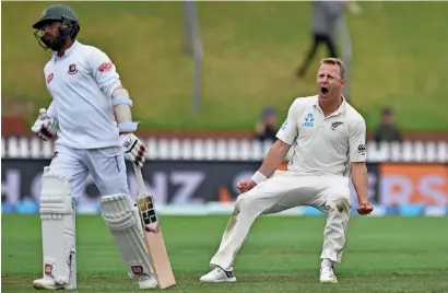  ?? AFP ?? Neil Wagner celebrates Mohammad Mithun’s dismissal during day three of the second Test in Wellington on Sunday. —