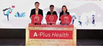  ??  ?? (From left) AIA chief marketing officer Heng Zee Wang, Anusha and head of product marketing Chee Foong Wai officiate the launch of the A-Plus Health, a first-in-market medical rider which not only complement­s customers recovery journey, but also rewards them for staying healthy.