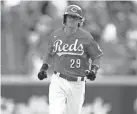  ?? ALBERT CESARE/THE ENQUIRER ?? Reds rookie outfielder TJ Friedl hit his first major league home run, which also was his first hit, in the sixth inning against the Dodgers on Sunday at Great American Ball Park in Cincinnati.