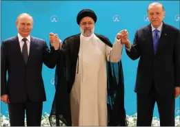  ?? TRIBUNE NEWS SERVICE ?? From left, Russian President Vladimir Putin, Iranian President Ebrahim Raisi and Turkish President Recep Tayyip Erdogan pose for a photo before talks in Tehran, Iran Tuesday.