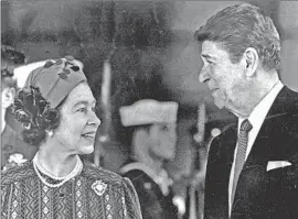  ?? George Rose Los Angeles Times ?? QUEEN ELIZABETH and President Reagan chat at Santa Barbara Airport before a visit to the Reagans’ hilltop ranch on March 1, 1983. Nature would interfere.