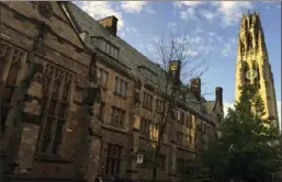  ?? Beth J. Harpaz/Associated Press ?? Harkness Tower on the campus of Yale University.