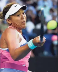  ?? Andy Brownbill / Associated Press ?? Naomi Osaka plays a forehand return to Madison Brengle during their second-round match at the Australian Open on Wednesday.