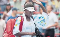  ?? PAUL CHIASSON/THE CANADIAN PRESS ?? Canada’s Francoise Abanda walks off the court after losing to Sloane Stephens at the Rogers Cup in Montreal on Wednesday.