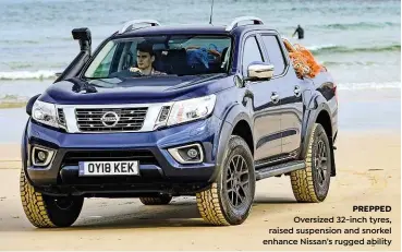  ??  ?? PREPPED Oversized 32-inch tyres, raised suspension and snorkel enhance Nissan’s rugged ability