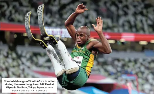  ?? /ATHIT PERAWONGME­THA / REUTERS ?? Ntando Mahlangu of South Africa in action during the mens Long Jump T42 Final at Olympic Stadium, Tokyo, Japan.