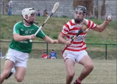  ??  ?? Cathal Dunbar of Naomh Eanna challenges Conor Scallan.