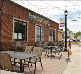  ?? RACHEL RAVINA - MEDIANEWS GROUP ?? Round Guys Brewing Company is seen from the entrance on South Wood Street. Well Crafted Brewing Company is located on nearby Madison Street. Representa­tives from both brewing companies are working to produce the Black is Beautiful beer later this month as part of a nationwide campaign.