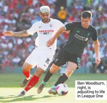  ??  ?? Ben Woodburn, right, is adjusting to life in League One