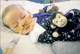  ??  ?? His parents should decide: Charlie fights for his life in a London hospital.