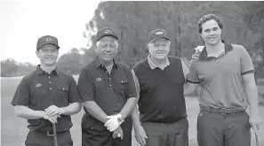  ?? AP Photo/ Phelan M. Ebenhack ?? ■ Lee Trevino, second from left, poses with his son, Daniel Trevino, left, Jack Nicklaus, and his grandson, G.T. Nicklaus, right, during the first round of the Father Son Challenge golf tournament Saturday in Orlando, Fla.