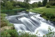  ?? NWA Democrat-Gazette/FLIP PUTTHOFF ?? Mammoth Spring in northeast Arkansas is the third largest spring in the Ozarks with an average flow of 234 million gallons per day. It’s located near the town of Mammoth Spring, near the Missouri state line.