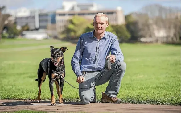  ??  ?? Waikato University senior psychology lecturer Dr Timothy Edwards and his dog Tui.