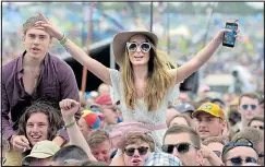  ??  ?? SAFETY FEARS: Festivalgo­ers enjoy a performanc­e