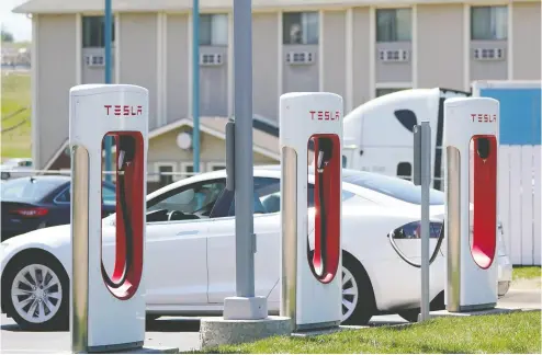  ?? ORLIN WAGNER / THE ASSOCIATED PRESS FILES ?? Tesla Inc. and BHP Group reached a deal last month after Tesla CEO Elon Musk had expressed concern
about supply due to challenges in sustainabl­e sourcing.
