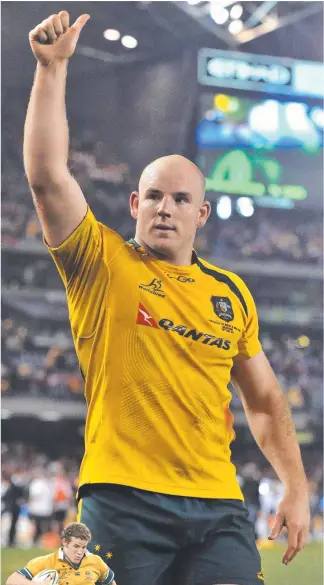  ?? Picture:s AFP and GETTY IMAGES ?? Stephen Moore salutes fans and (inset) as a raw rookie taking on the Samoan defence in his Test debut in Sydney in 2005.